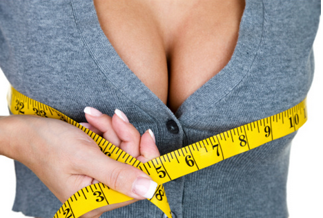 Woman Measuring Breasts